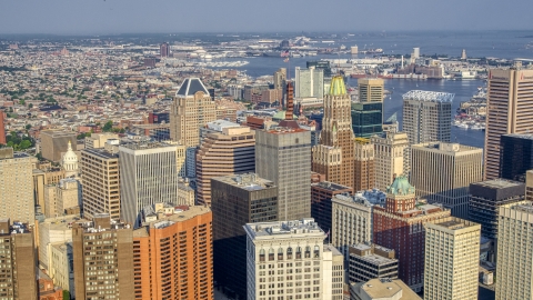 AXP073_000_0012F - Aerial stock photo of Schaefer Tower and Bank of America Building in Downtown Baltimore, Maryland