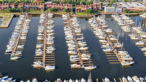 AXP073_000_0015F - Aerial stock photo of Boats docked at Anchorage Marina in Baltimore, Maryland