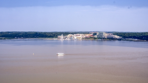 AXP075_000_0002F - Aerial stock photo of Marina and Capitol Wheel by Gaylord National Resort & Convention Center at National Harbor, Maryland