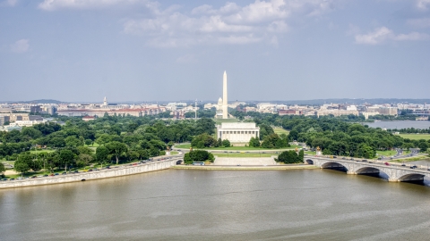 AXP075_000_0020F - Aerial stock photo of The Washington Monument and Lincoln Memorial in Washington DC