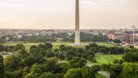 AXP076_000_0007F - Aerial stock photo of The White House and Washington Monument, Washington D.C., sunset