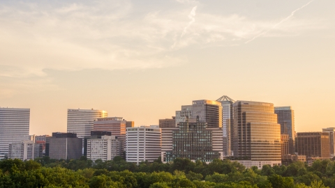 AXP076_000_0008F - Aerial stock photo of Office buildings in Arlington, Virginia at sunset