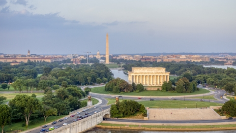 AXP076_000_0012F - Aerial stock photo of The Lincoln Memorial and Reflecting Pool, Washington Monument, National Mall, Washington D.C., sunset