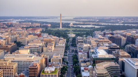 AXP076_000_0013F - Aerial stock photo of The White House, Washington Monument, and Jefferson Memorial, Washington D.C., sunset