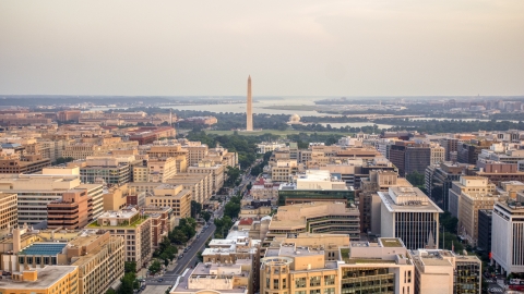 AXP076_000_0018F - Aerial stock photo of A wide view of the White House, Washington Monument, and Jefferson Memorial, Washington D.C., sunset