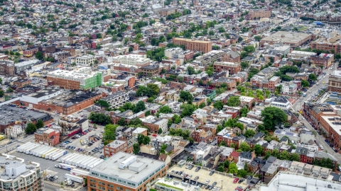 AXP078_000_0008F - Aerial stock photo of Shops and apartment buildings in Baltimore, Maryland