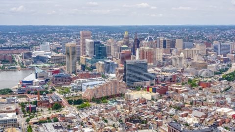 AXP078_000_0013F - Aerial stock photo of Skyscrapers and city buildings in the Downtown Baltimore skyline, Maryland