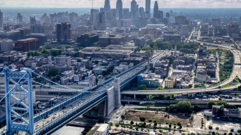 The Benjamin Franklin Bridge with the skyline of Downtown Philadelphia in the background, Pennsylvania Aerial Stock Photos | AXP079_000_0002F