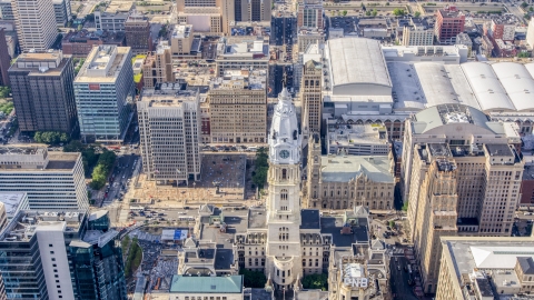 AXP079_000_0006F - Aerial stock photo of The William Penn statue atop Philadelphia City Hall in Pennsylvania