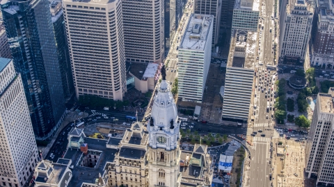 AXP079_000_0007F - Aerial stock photo of The William Penn statue on the top of Philadelphia City Hall in Pennsylvania