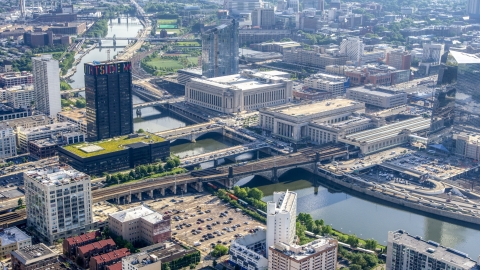 AXP079_000_0008F - Aerial stock photo of 30th Street Station and Main Post Office across the Schuylkill River, Philadelphia, Pennsylvania