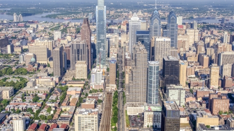 AXP079_000_0016F - Aerial stock photo of Talk towers and city buildings in downtown Philadelphia, Pennsylvania