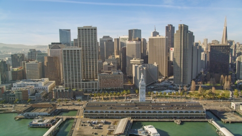 DCSF05_008.0000197 - Aerial stock photo of The Ferry Building and skyscrapers in Downtown San Francisco, California