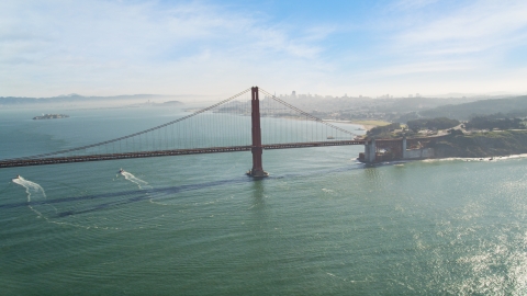 DCSF05_037.0000043 - Aerial stock photo of The Golden Gate Bridge with the downtown skyline in the background, San Francisco, California