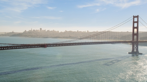 The famous Golden Gate Bridge and the downtown skyline in distance, San Francisco, California Aerial Stock Photos | DCSF05_043.0000344