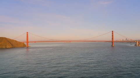 DCSF07_047.0000002 - Aerial stock photo of Wide view of the Golden Gate Bridge at sunset in San Francisco, California