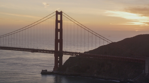 DCSF10_027.0000060 - Aerial stock photo of The north side of the Golden Gate Bridge, San Francisco, California, sunset