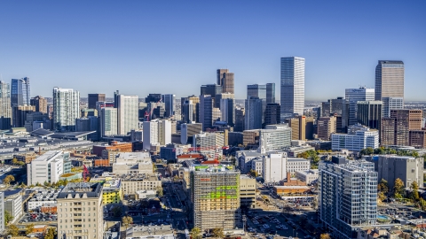 DXP001_000136 - Aerial stock photo of City skyline's giant skyscrapers behind several office buildings, Downtown Denver, Colorado