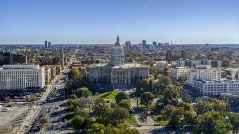 The Colorado State Capitol viewed from tree-lined Civic Center Park in Downtown Denver, Colorado Aerial Stock Photos | DXP001_000146