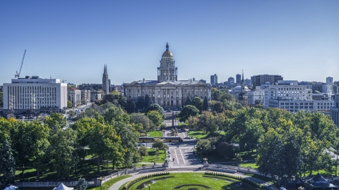 DXP001_000147 - Aerial stock photo of The Colorado State Capitol seen from tree-lined Civic Center Park in Downtown Denver, Colorado