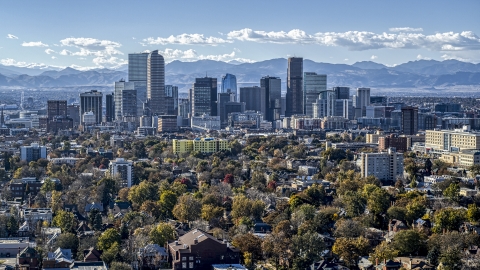 DXP001_000163 - Aerial stock photo of The city's skyline with mountains in the background, Downtown Denver, Colorado