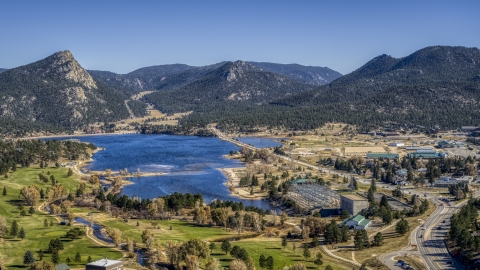 DXP001_000219 - Aerial stock photo of Lake Estes and mountains seen from the golf course in Estes Park, Colorado