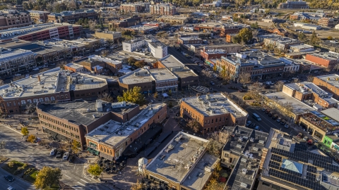 Brick office buildings and shops around a quiet intersection in Fort Collins, Colorado Aerial Stock Photos | DXP001_000232