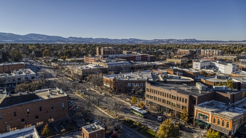 Quiet street by shops and brick office buildings in Fort Collins, Colorado Aerial Stock Photos | DXP001_000236