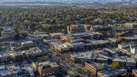 DXP001_000241 - Aerial stock photo of Shops and brick office buildings beside a quiet street in Fort Collins, Colorado