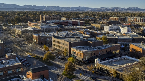 A quiet road with brick office buildings and small shops in Fort Collins, Colorado Aerial Stock Photos | DXP001_000244