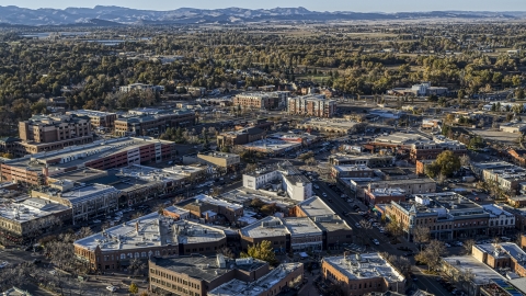 Small shops lining a busy town road in Fort Collins, Colorado Aerial Stock Photos | DXP001_000250