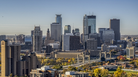 DXP001_000281 - Aerial stock photo of A condo complex at sunrise, with the city skyline in the background, Downtown Minneapolis, Minnesota