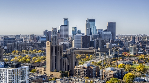 DXP001_000287 - Aerial stock photo of Apartment and condo complexes in the foreground, city skyline in the background, Downtown Minneapolis, Minnesota