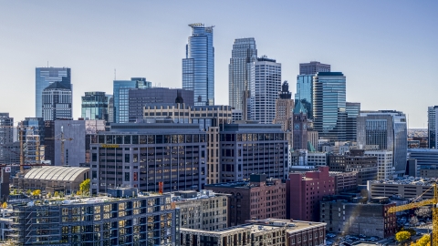 DXP001_000302 - Aerial stock photo of Office buildings with city skyline's skyscrapers in the background, Downtown Minneapolis, Minnesota