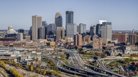 DXP001_000315 - Aerial stock photo of The city skyline's skyscrapers seen from the I-394 freeway interchange with light traffic, Downtown Minneapolis, Minnesota