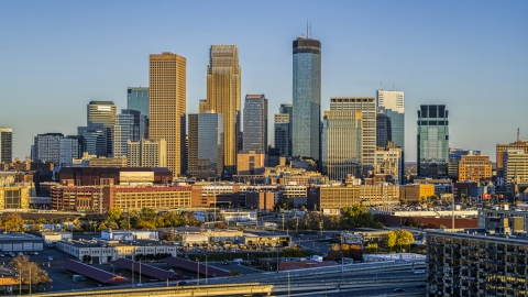 DXP001_000323 - Aerial stock photo of Towering skyscrapers of the city's skyline at sunset in Downtown Minneapolis, Minnesota