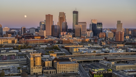 DXP001_000326 - Aerial stock photo of Skyscrapers of the city's skyline at sunset in Downtown Minneapolis, Minnesota