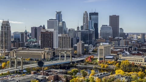 DXP001_000371 - Aerial stock photo of Hennepin Avenue Bridge spanning the river, and the city skyline, Downtown Minneapolis, Minnesota