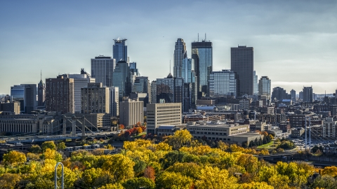 DXP001_000405 - Aerial stock photo of A view over autumn trees at the city's skyline, Downtown Minneapolis, Minnesota