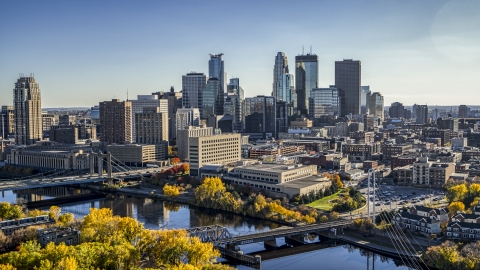 DXP001_000409 - Aerial stock photo of The towering skyline and bridges spanning the river, Downtown Minneapolis, Minnesota