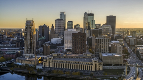 DXP001_000419 - Aerial stock photo of Apartment complex and USPS building at sunset, skyline in background, Downtown Minneapolis, Minnesota