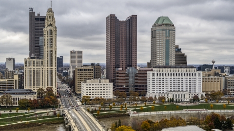 DXP001_000491 - Aerial stock photo of Discovery Bridge spanning the Scioto River and the city's skyline, Downtown Columbus, Ohio