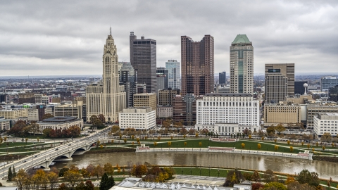 DXP001_000493 - Aerial stock photo of Towering skyscrapers of the city's downtown skyline on the opposite side of the river, Downtown Columbus, Ohio