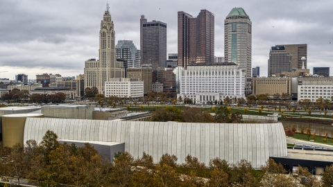 DXP001_000495 - Aerial stock photo of Science museum with the city's downtown skyline in the background, Downtown Columbus, Ohio