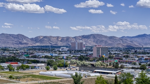 DXP001_004_0002 - Aerial stock photo of A view of the Grand Sierra and Ramada hotels in Reno, Nevada