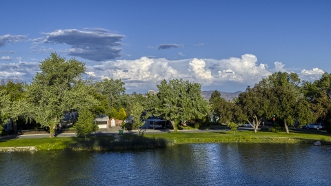 Lakefront homes and trees in Reno, Nevada Aerial Stock Photos | DXP001_005_0002