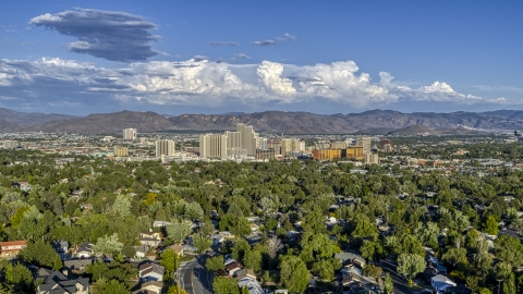 City skyline seen from tree-lined neighborhoods in Reno, Nevada Aerial Stock Photos | DXP001_005_0005