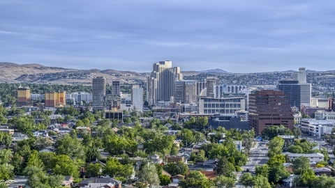 DXP001_006_0013 - Aerial stock photo of High-rise casino resorts and office buildings seen from neighborhoods in Reno, Nevada