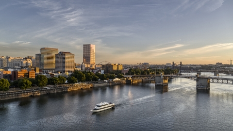 DXP001_010_0009 - Aerial stock photo of Office buildings, skyscrapers, and the Morrison Bridge seen from the Willamette River, Downtown Portland, Oregon