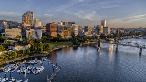 DXP001_010_0011 - Aerial stock photo of The city skyline and the Hawthorne Bridge seen from over the Willamette River, Downtown Portland, Oregon